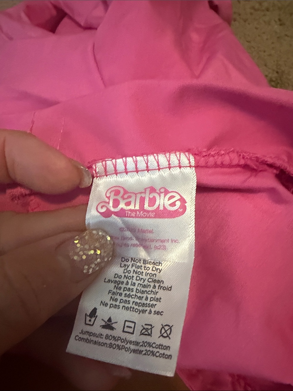 Barbie pink power jumpsuit size small